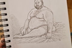 Man sitting on bed